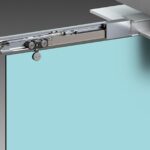IN.15.955 - 1 SISTEMA OCULTO PARA PUERTAS CORREDERAS EN CRISTAL CON SOFT CLOSING
